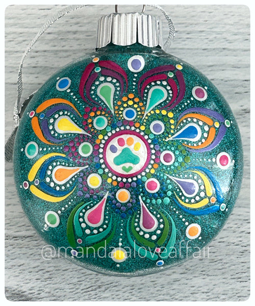 Dot Mandala Hand Painted Paw Print Christmas Ornament - 3" plastic flat bulb - rainbow metallics on teal glitter